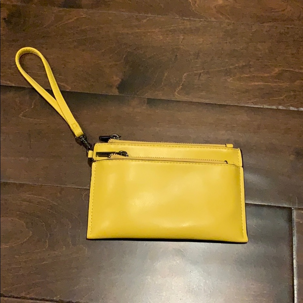 Wallet with clutch and pockets